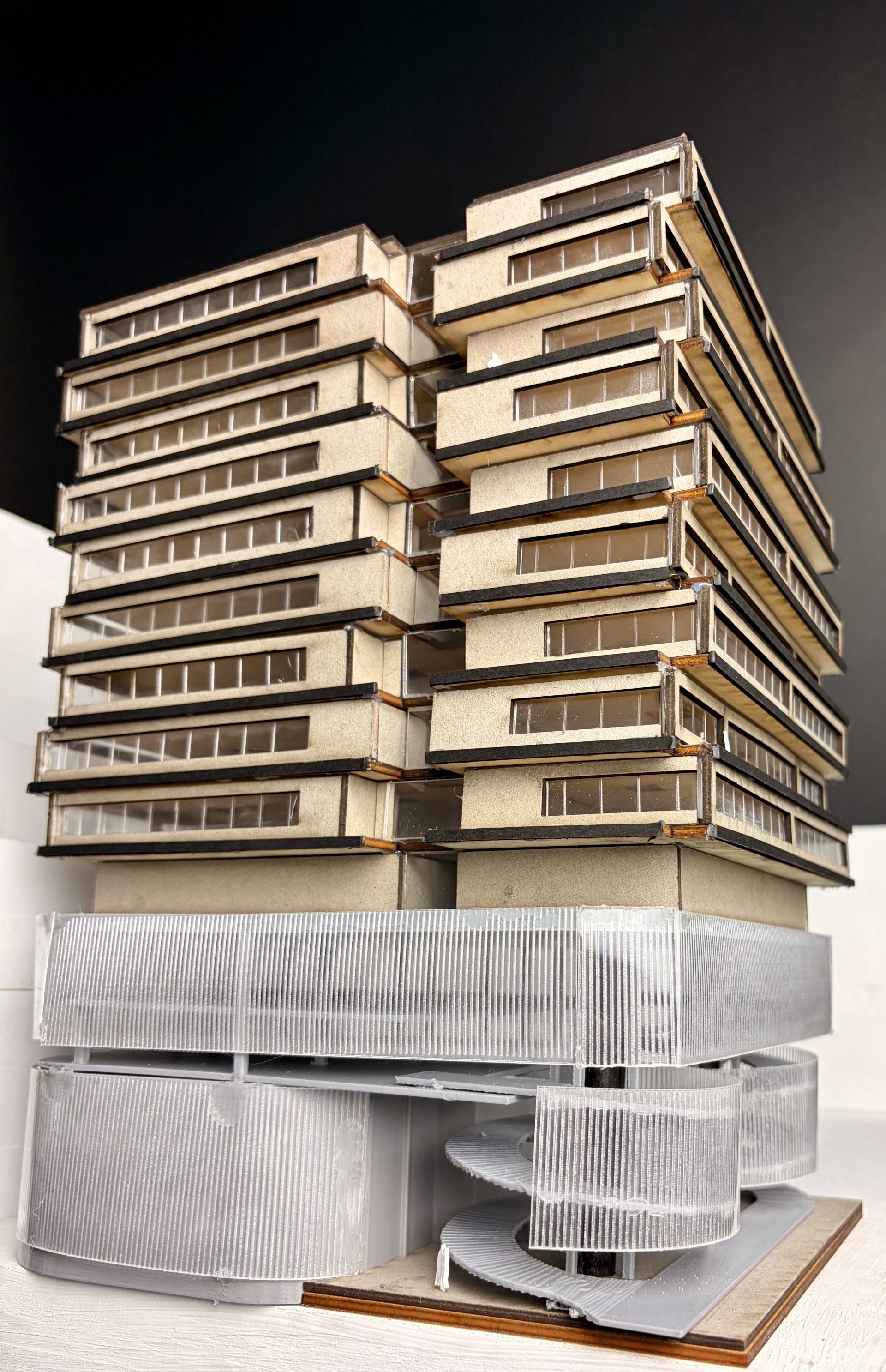 Physical study model of the Chicago Theatre and Film School, showing the shifting layered upper volumes of the dorms and classrooms above the theatre base