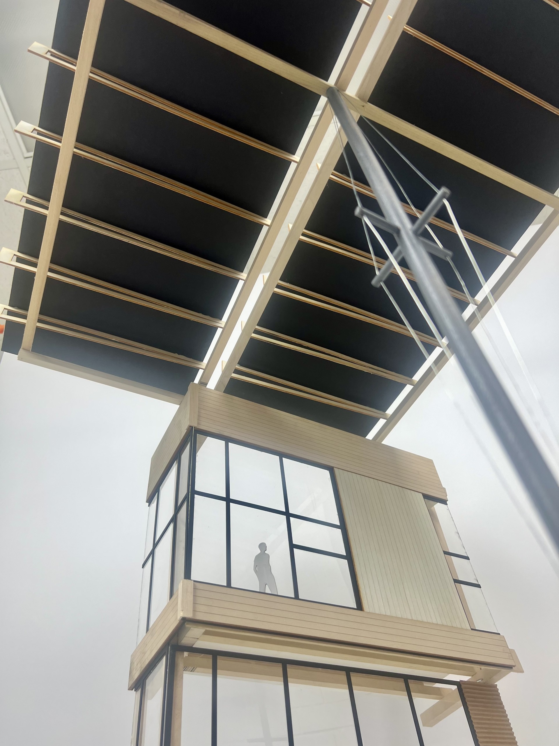 Upward view of the Kendeda Building case study model showing the overhead roof structure and building corner