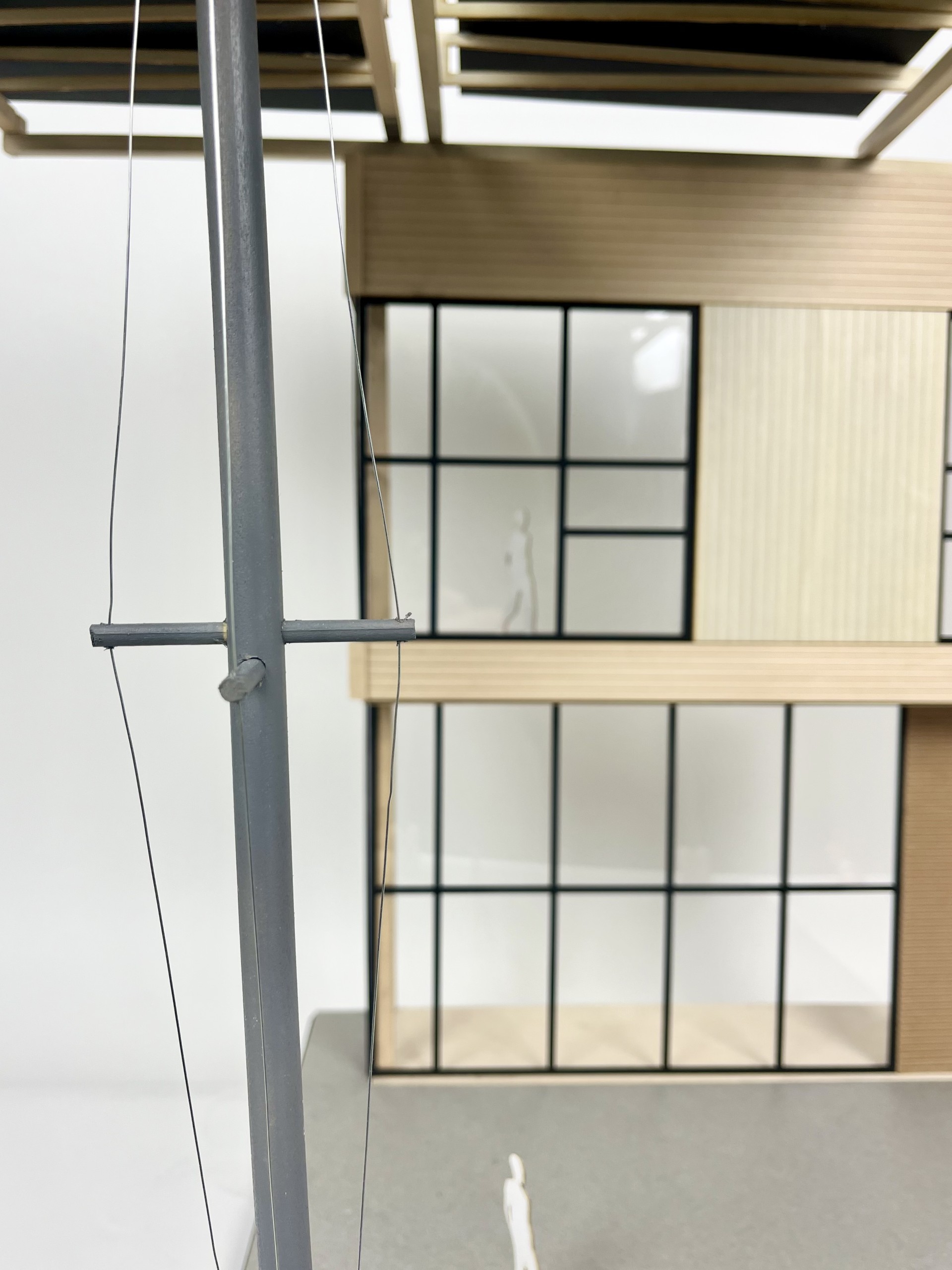 Close-up of the Kendeda Building case study model's structural mast and cross-bracing detail